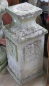 A pre-cast stone pedestal of square form, 76cm high.