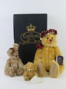 A limited edition Merrythought small teddy bear No 329 of 500 holding blanket in paw and standing