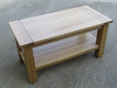 A contemporary oak coffee table, 100 x 50 x 50.5cm.