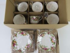 A Royal Albert Old Country Roses; a set of six trios having erased marks to back.