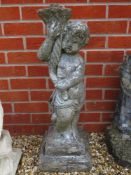 A pre-cast base for a birdbath or table in the form of a child carrying a cornucopia,