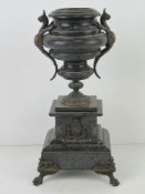 A Victorian slate architectural garniture having urn over decorated with mythical winged beasts ,