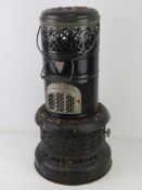 A barge type oil heater by Velor.