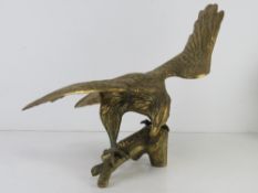 A large brass figurine of an eagle, wingspan approx 47cm.