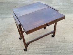 A metamorphic tea table, 76 x 69cm extended, 67cm high.