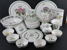 A quantity of Portmerion in Botanic Garden pattern including chargers, plates, mixing bowl, jug,