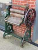 A 'new duplex' hand cranked mangle with rollers, sprung tensioners and gear cogs,