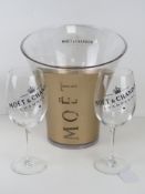 A plastic Moet & Chandon ice / champagne bucket with pair of Moet & Chandon glasses.
