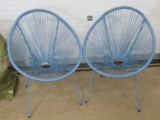 A pair of 1960's egg style aqua blue garden chairs.