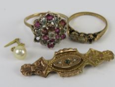 Two 9ct gold rings a/f, a 9ct gold brooch a/f and a 9ct gold piercing. Total weight 6.4g.