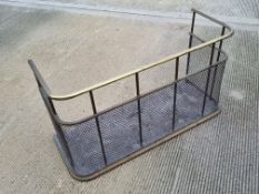 A brass and metal fireguard, 88cm wide.