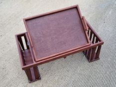 A breakfast tray having side compartments, book stand and lift out tray, 72.5 x 42cm.
