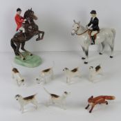 Beswick Hunting Group; Huntsman on bay rearing horse 868 with black backstamp, a/f naive repair,