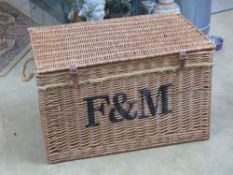 An oversized coffee table type Fortnum & Masons wicker hamper, 79 x 51 x 49cm.