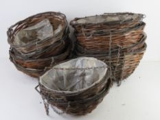 A quantity of hanging baskets.