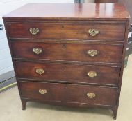 A 19th century mahogany chest of four graduating drawers,