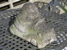 A pre-cast hedgehog garden ornament, 31cm in length.