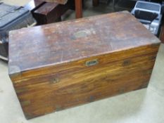 A Camphor wood and brass bound late 19th century campaign chest having recessed brass handle to