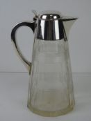 A HM silver lidded cut glass water jug or carafe, Birmingham 1919, 24cm high,