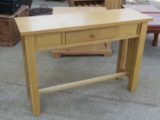 A contemporary oak console table, 38 x 115 x 80cm.