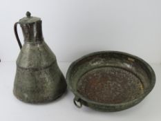 A large copper colander and jug of Arabic influence, colander 41.5cm dia.
