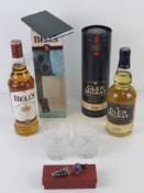Glen Moray single malt Scoch whisky 70cl in tin together with Bells 8 years in box,