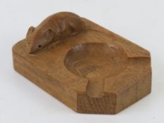 A Robert Mouseman Thompson oak ashtray, carved with signature mouse, 10.5 x 7.