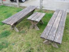 A pair of three plank picnic table type benches together with matching single seat.