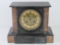 A 19th century slate and marble architectural mantel clock