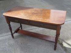 A mahogany hall table having replacement top, two drawers, 128 x 58.5 x 71cm.