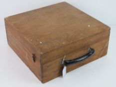 A wooden tool box having side clasps and top handle, 35.5 x 35 x 15cm.