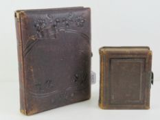 Two antique leather bound photograph albums,