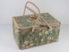 A vintage sewing box in 1970s Liberty style fabric.