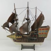 A vintage model 'St George' (English Gun Ship) having three masts and rigging, a/f,