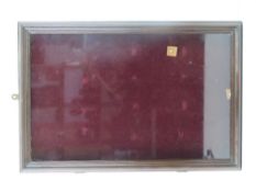 A glazed display cabinet, 62 x 42cm.