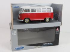 A 1:25 scale model of a 1962 VW Microbus, in box.