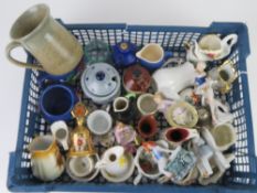 A quantity of assorted ceramics including a large quantity of cabinet miniature jugs.