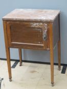 A rouge marble topped pot cupboard or washstand, 56 x 43 x 78.5cm.