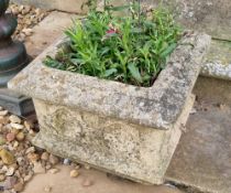 A pair of square shaped stone planters having quatrefoil decoration, 34 x 34 x 24cm.