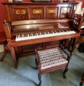 An upright overstrung piano in the Arts & Crafts style by Gors & Karlmann, 148 x 66 x 128cm.