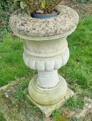 A pre-cast stone urn 80cm high, a/f.