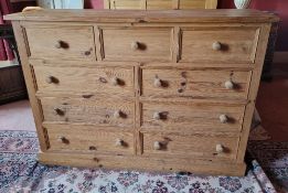 A contemporary pine chest of three over six drawers, 150 x 45 x 105cm.