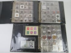 Three folios of assorted British coinage