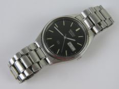 A Seiko SQ stainless steel wristwatch wi