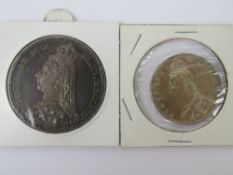 An 1887 silver crown together with an 18