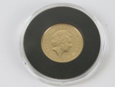 A 22ct gold 2019 proof full sovereign with paperwork and sleeve.