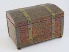 A copper and brass jewellery box or tea