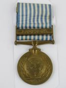 A United Nations Korea medal and ribbon.