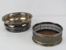 Two silver plated wine coasters, 12cm an