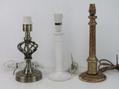 Three assorted table lamps, one painted